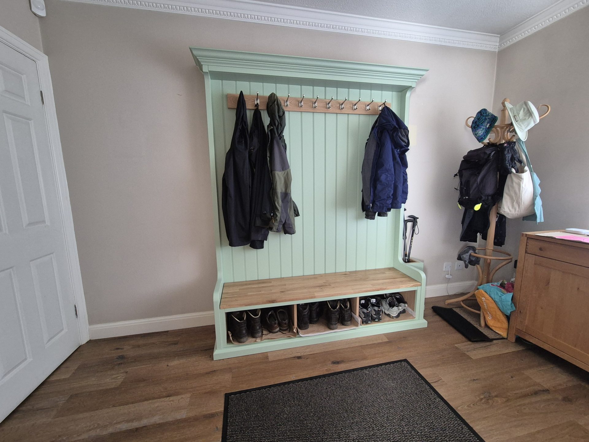 Hallway bench with coat hooks and shoe storage